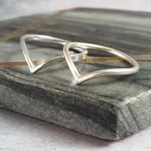 Silver wishbone bands