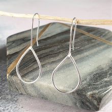 Silver shiny teardrop hanging earrings