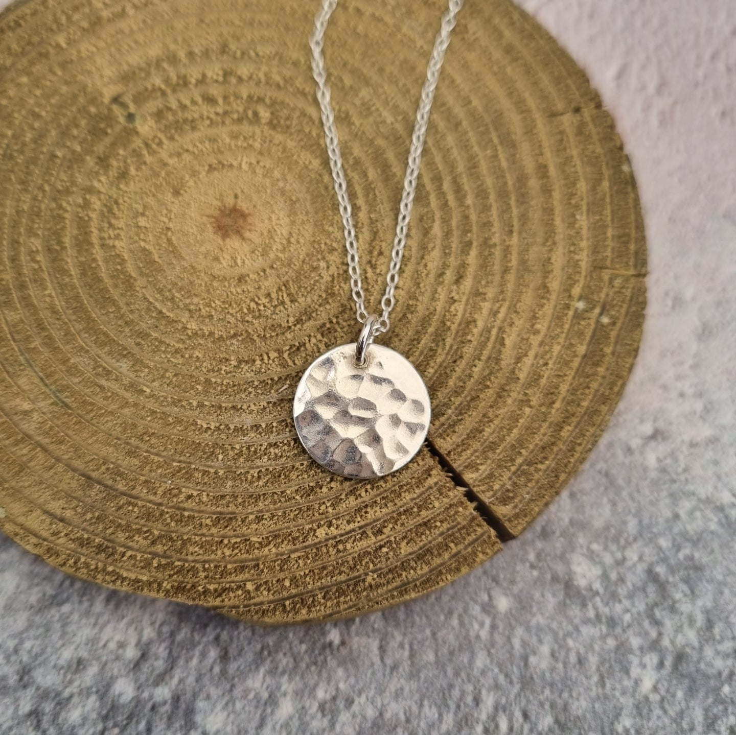 Buy Hammered Silver Sri Aurobindo Symbol Pendant | Auroville.com